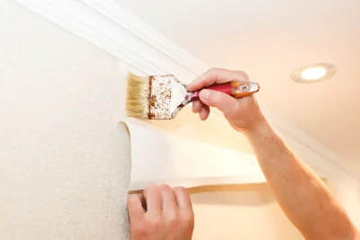 Pose de papier peint à Coyrière — revêtements muraux et toiles de verre